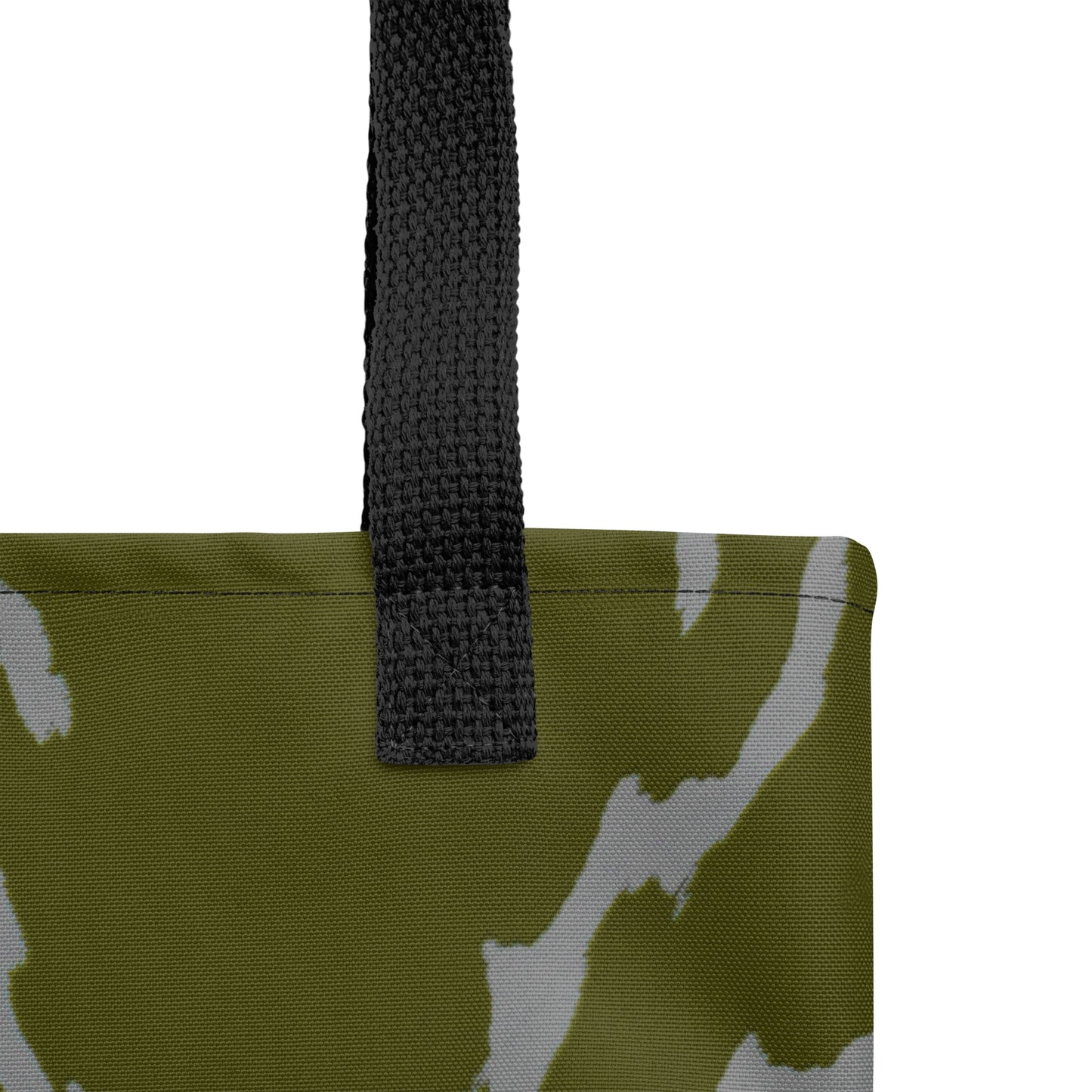 Close-up of TASHAU Urban Mirage tote bag showing olive green base and gray abstract details