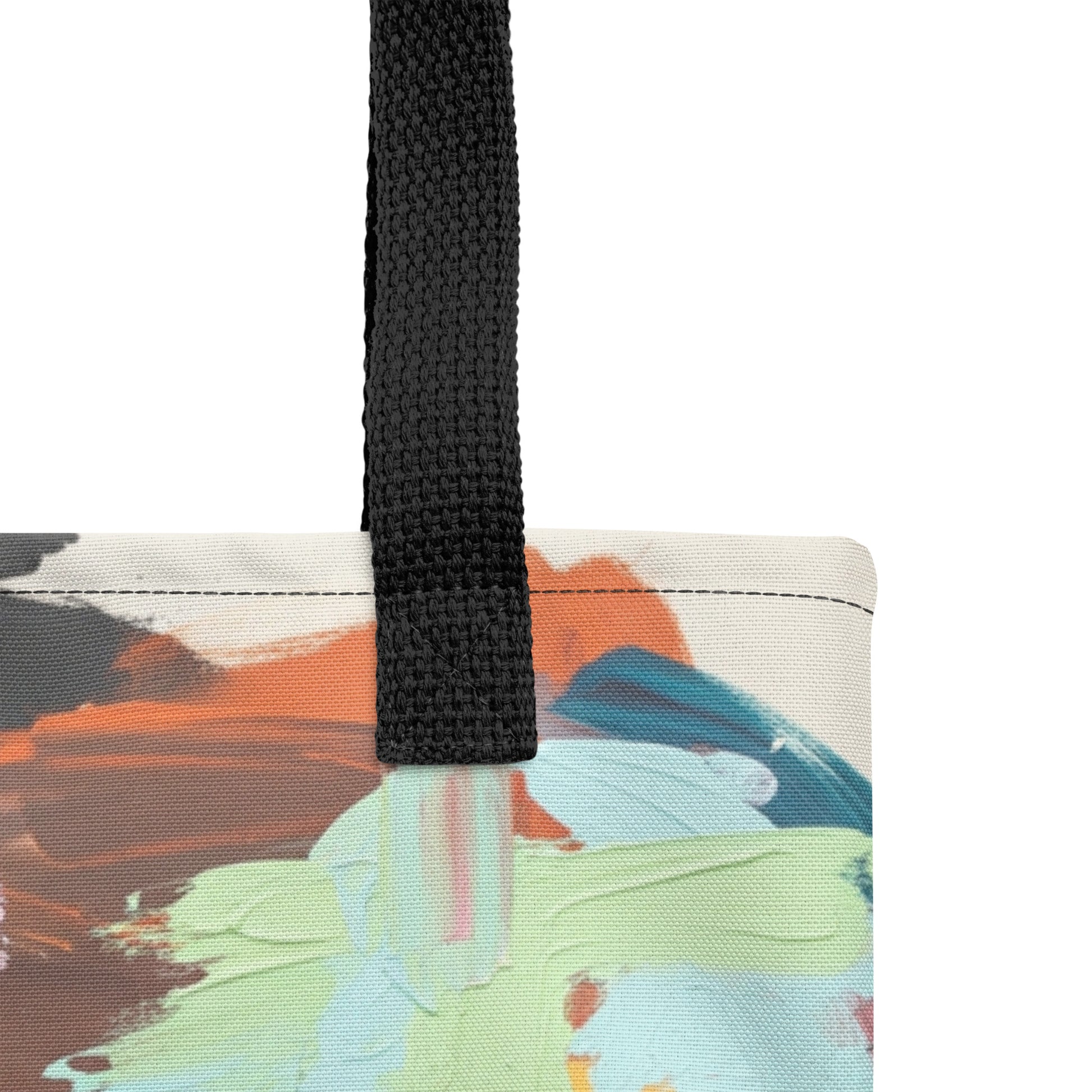 Close-up of a colorful bag with a black strap on a white background by TASHAU.