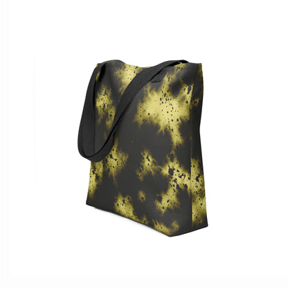 Side-view of a stylish unisex tote bag with bold black and yellow artistic pattern.