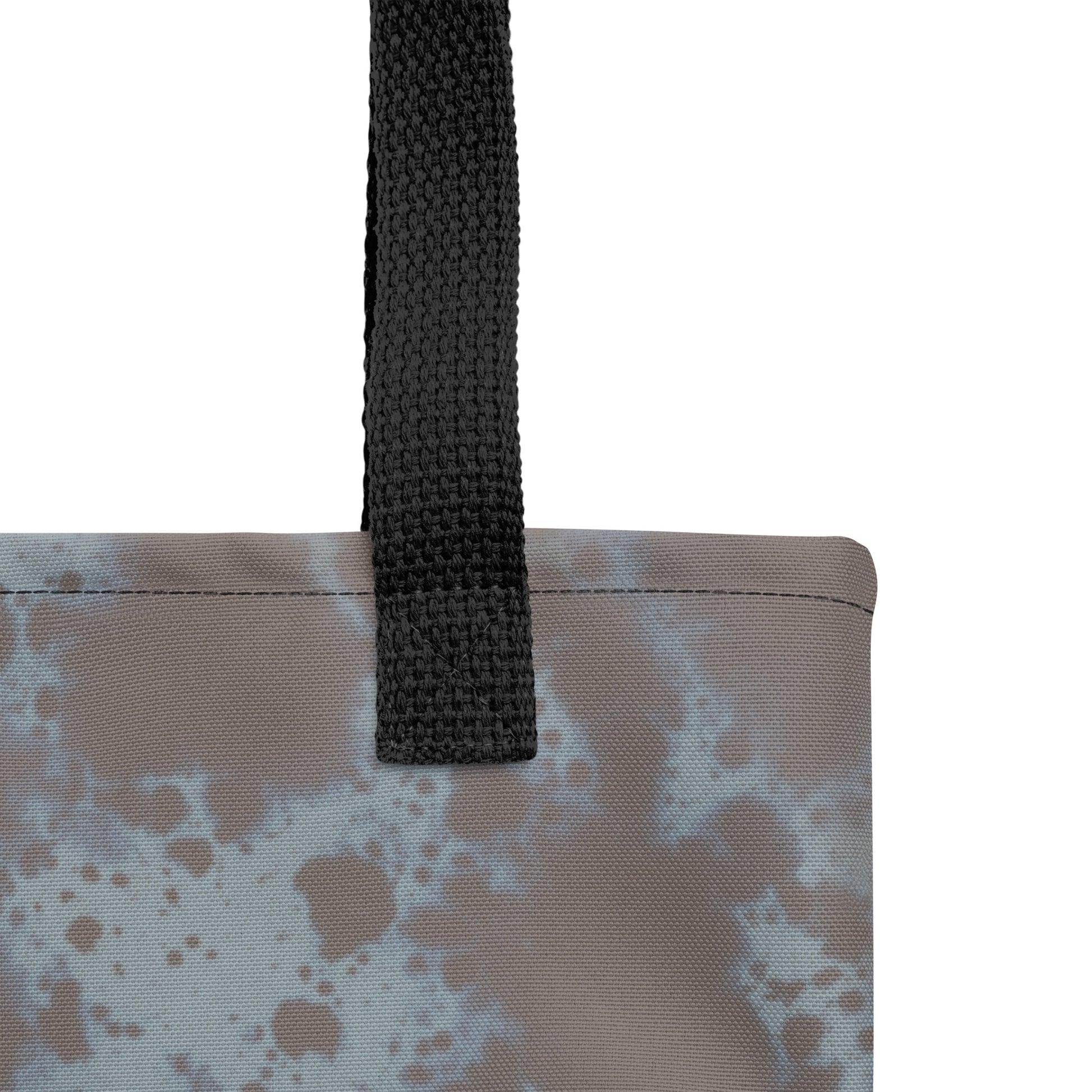 Artistic TASHAU eco tote with rugged stone mountain look.