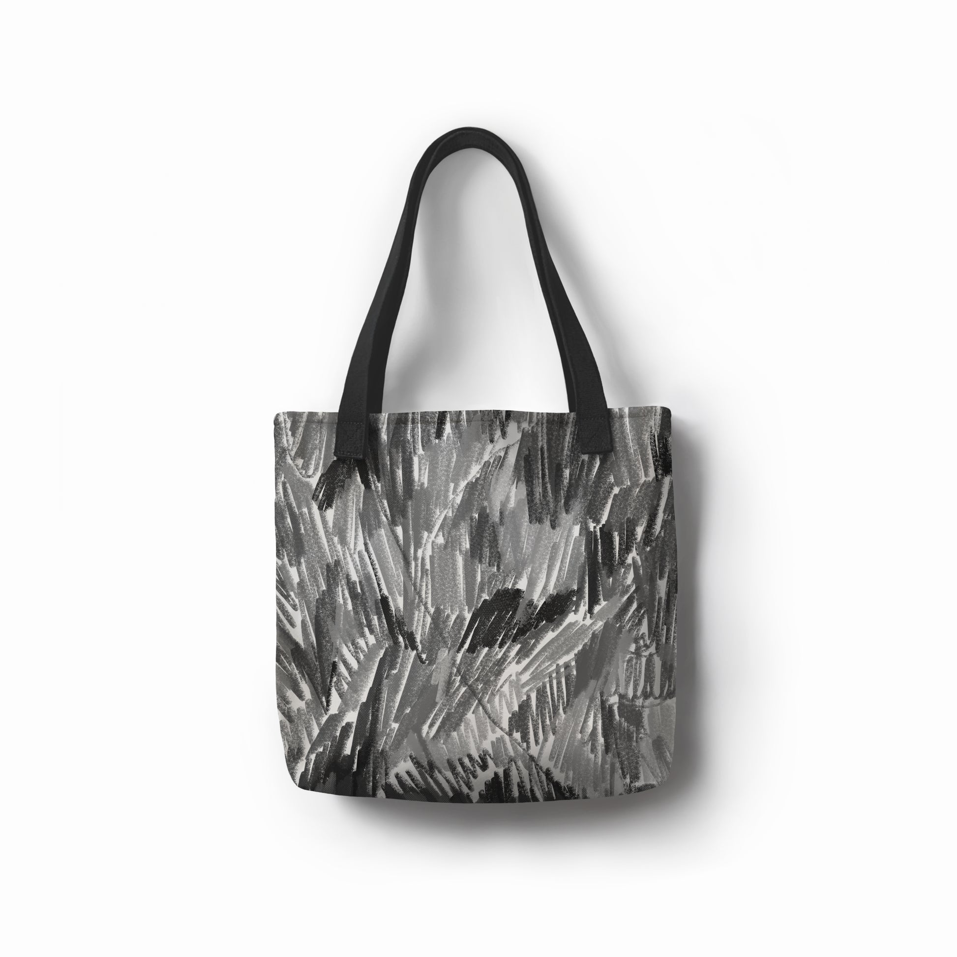 Eco-friendly grey tote bag with abstract charcoal brushstroke design by TASHAU.