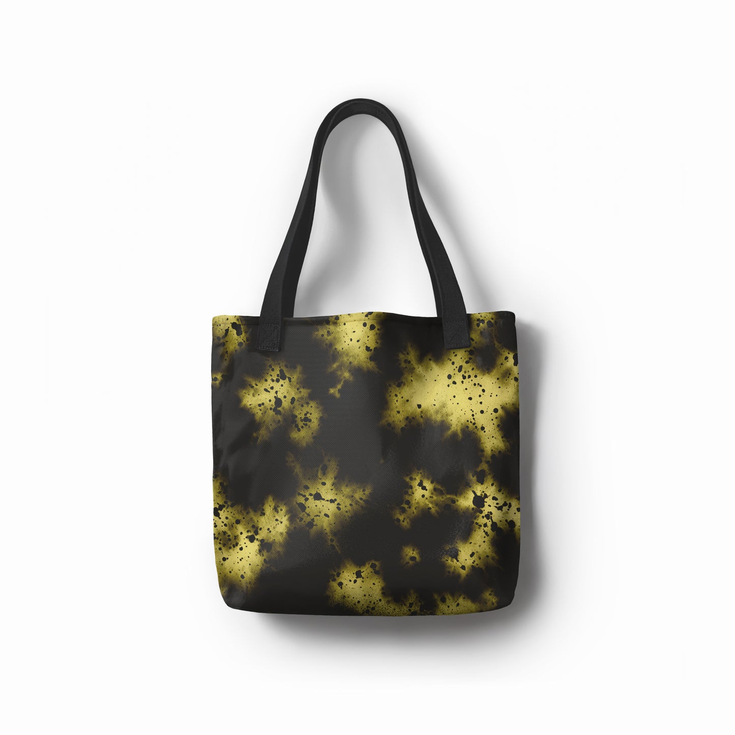 Front view of artistic tote bag in black and yellow abstract starburst design by TASHAU.