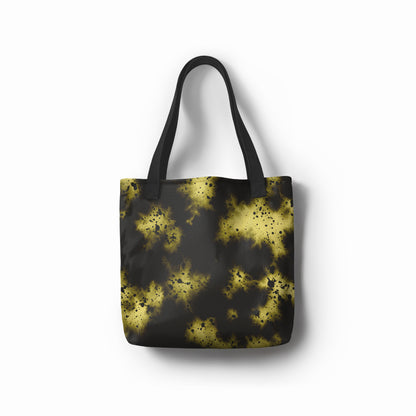 Front view of artistic tote bag in black and yellow abstract starburst design by TASHAU.