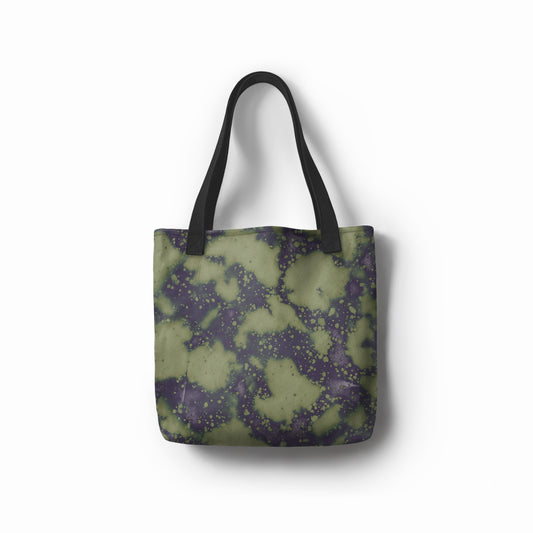 Front view of artistic tote bag Verdant Shadow in green and dark blue abstract print by TASHAU.