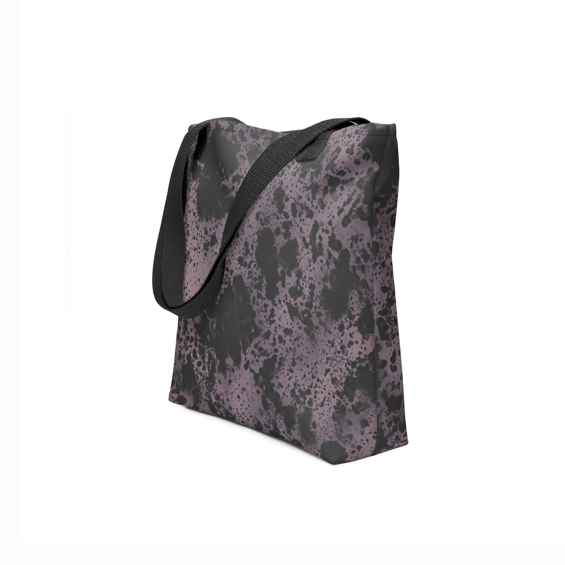 Unique designer tote bag with artistic stonewashed black and purple ash pattern.
