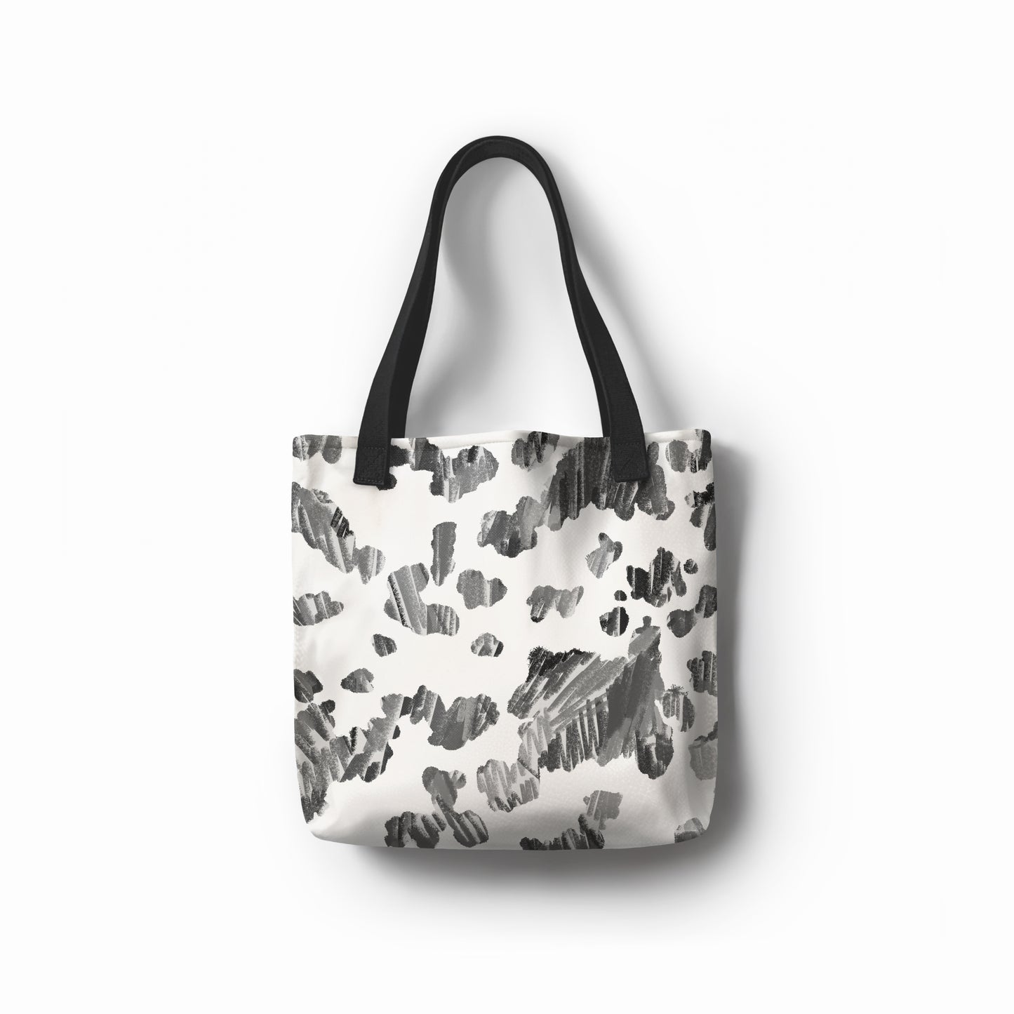 Black and white abstract tote bag with sketch-style pattern – Graphite Dapple design.