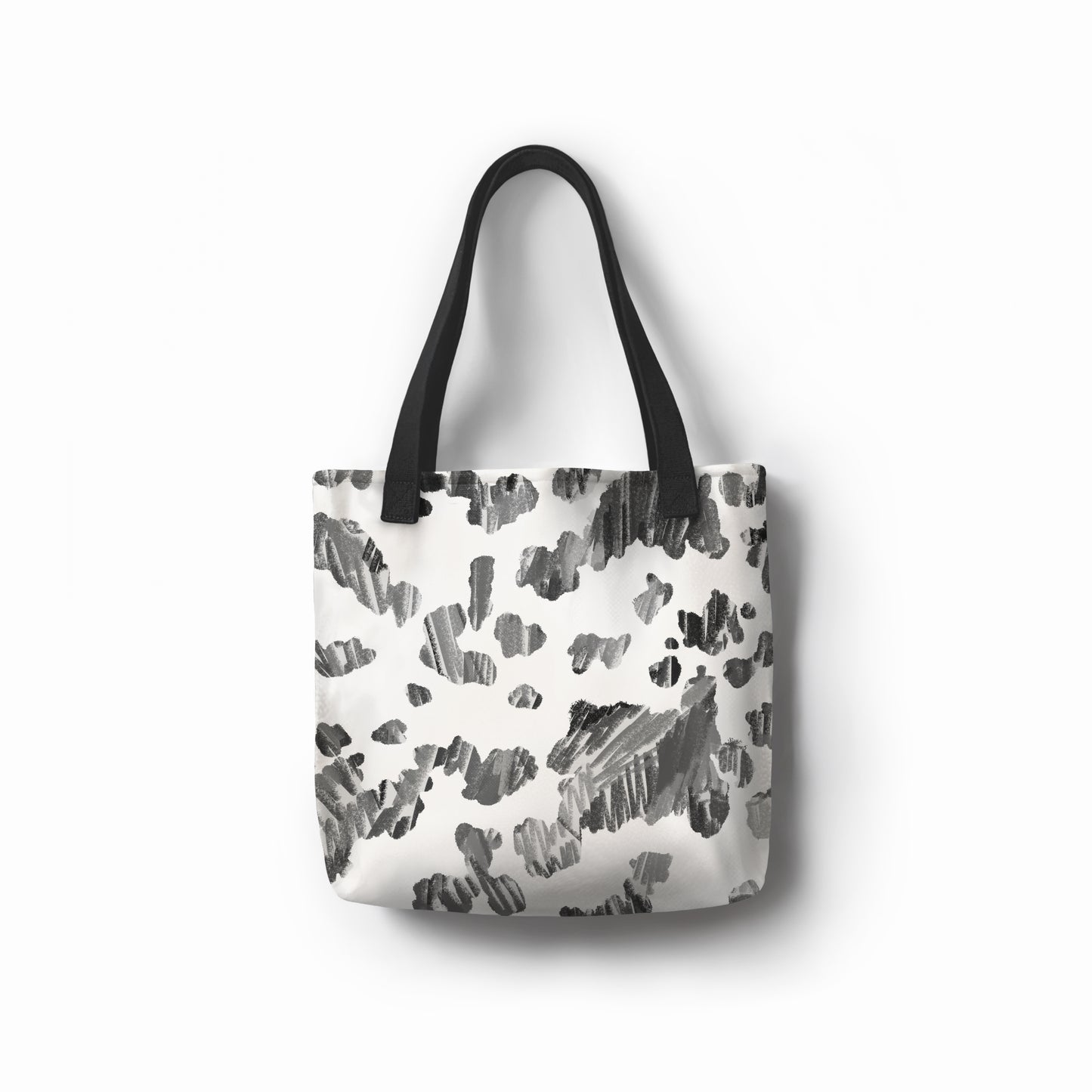 Eco-friendly canvas tote featuring monochrome spotted ink-style print by TASHAU.