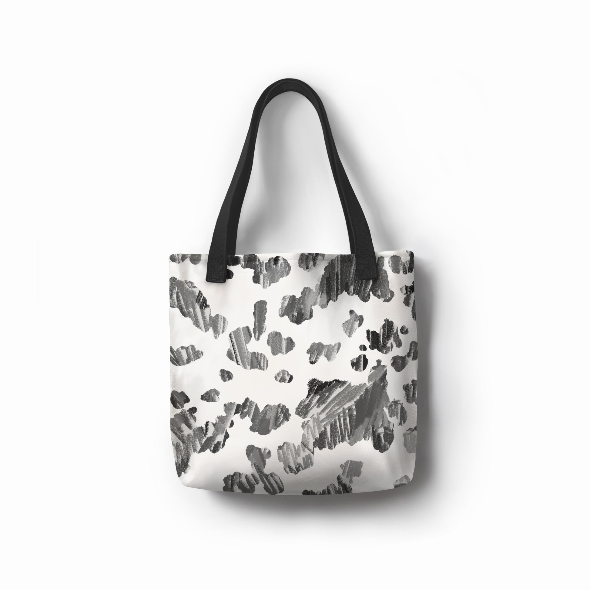 Eco-friendly canvas tote featuring monochrome spotted ink-style print by TASHAU.