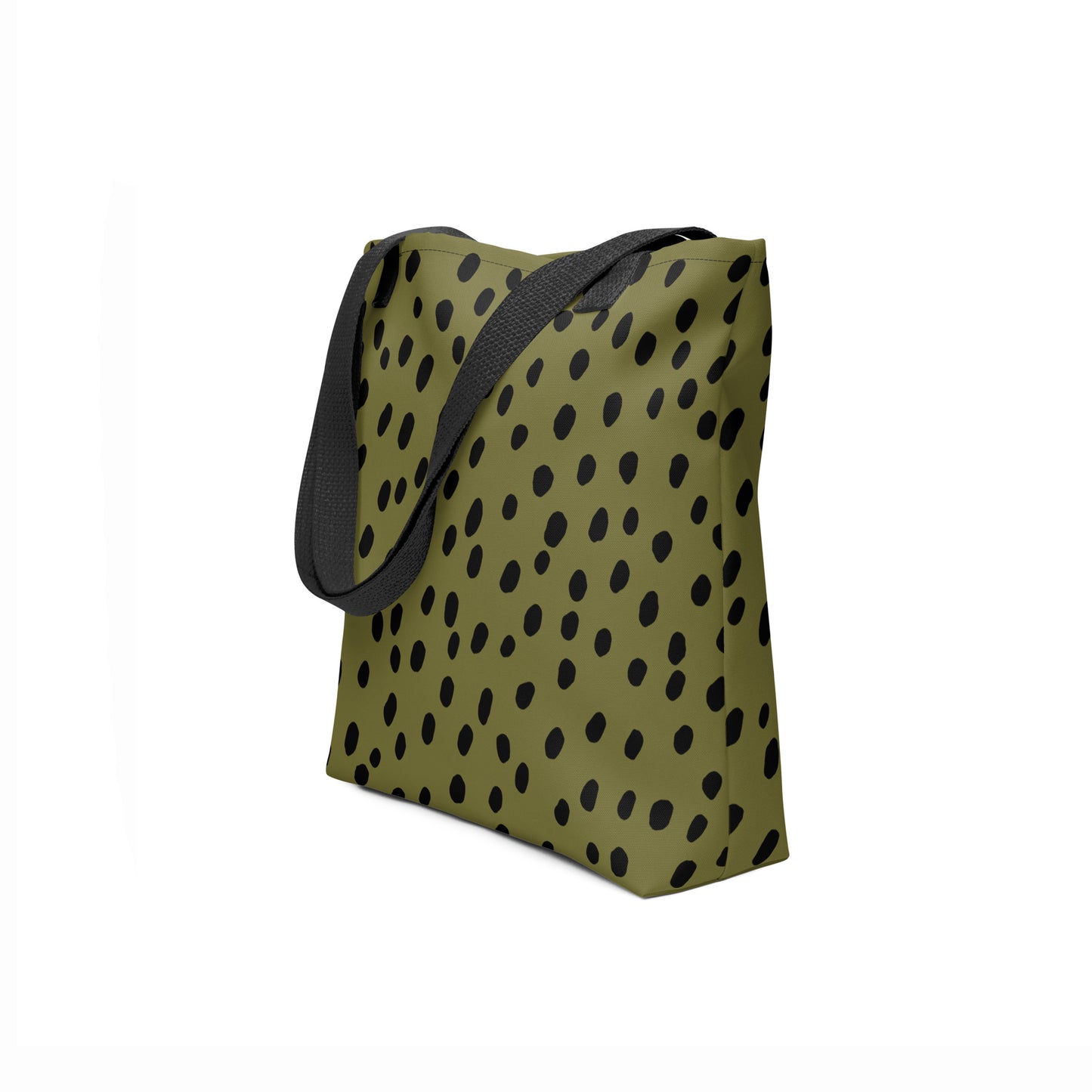 Side angle of TASHAU olive green tote with bold black dot pattern.