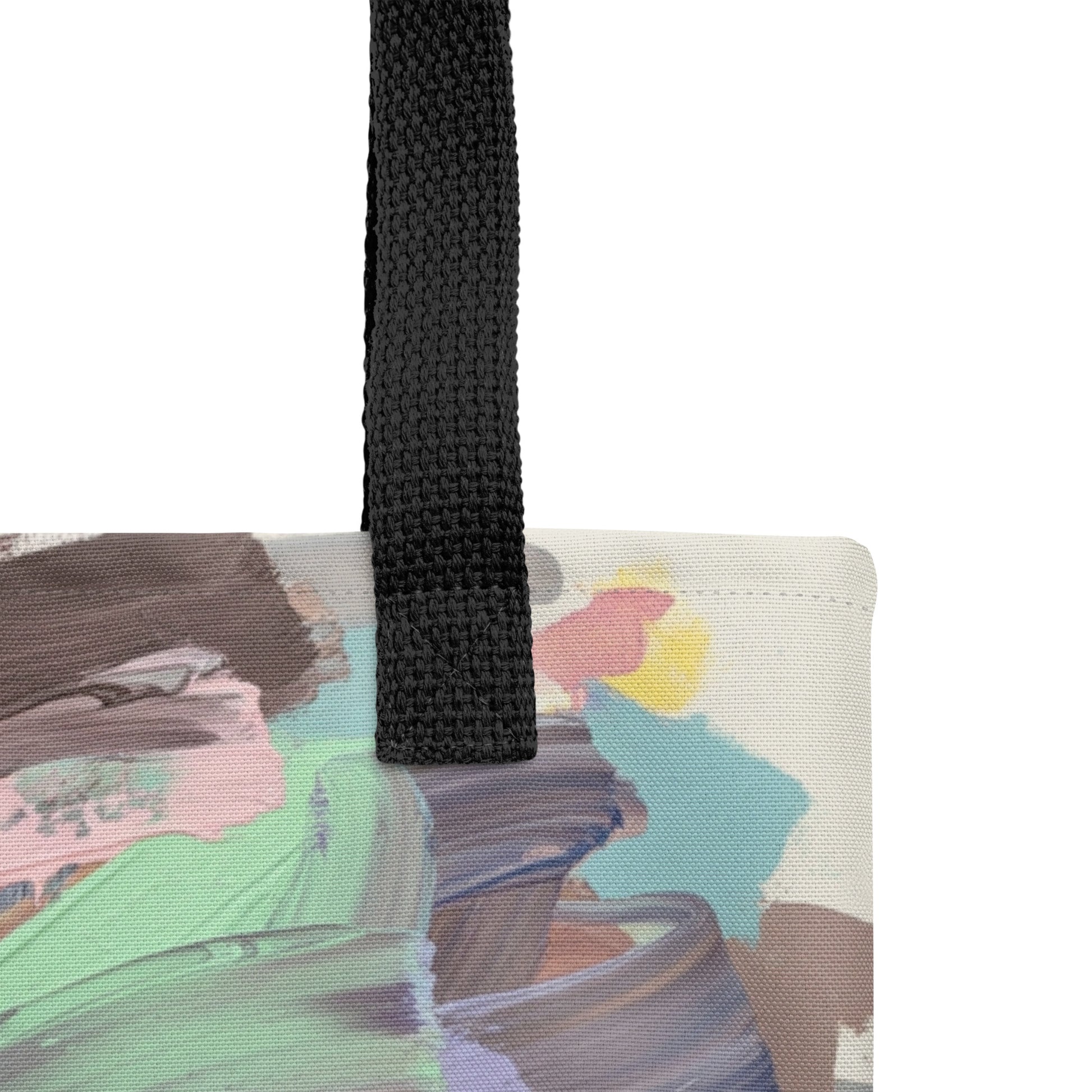 Close-up of pastel abstract tote bag texture showing layered brushstroke design in soft, blended colors.