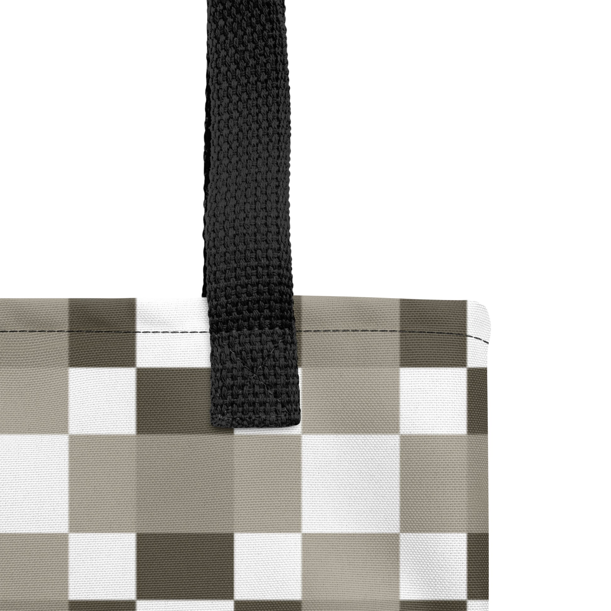 Trendy tote bag with modern black, white, and grey checkerboard style.