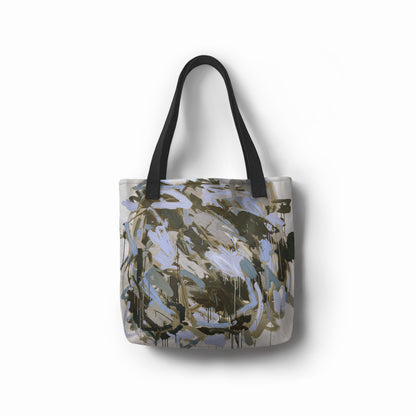 TASHAU canvas tote with river stone-inspired design in muted blue and gray.