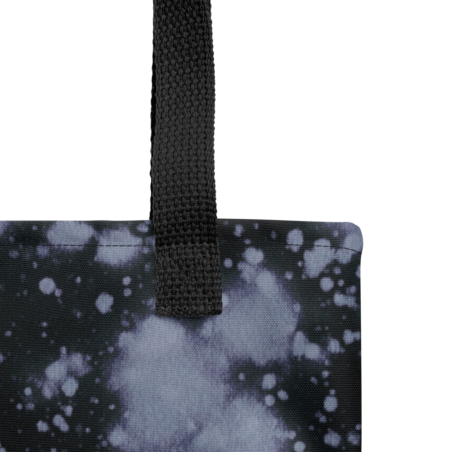 Sustainable canvas tote bag with black and indigo blue cosmic-inspired design.