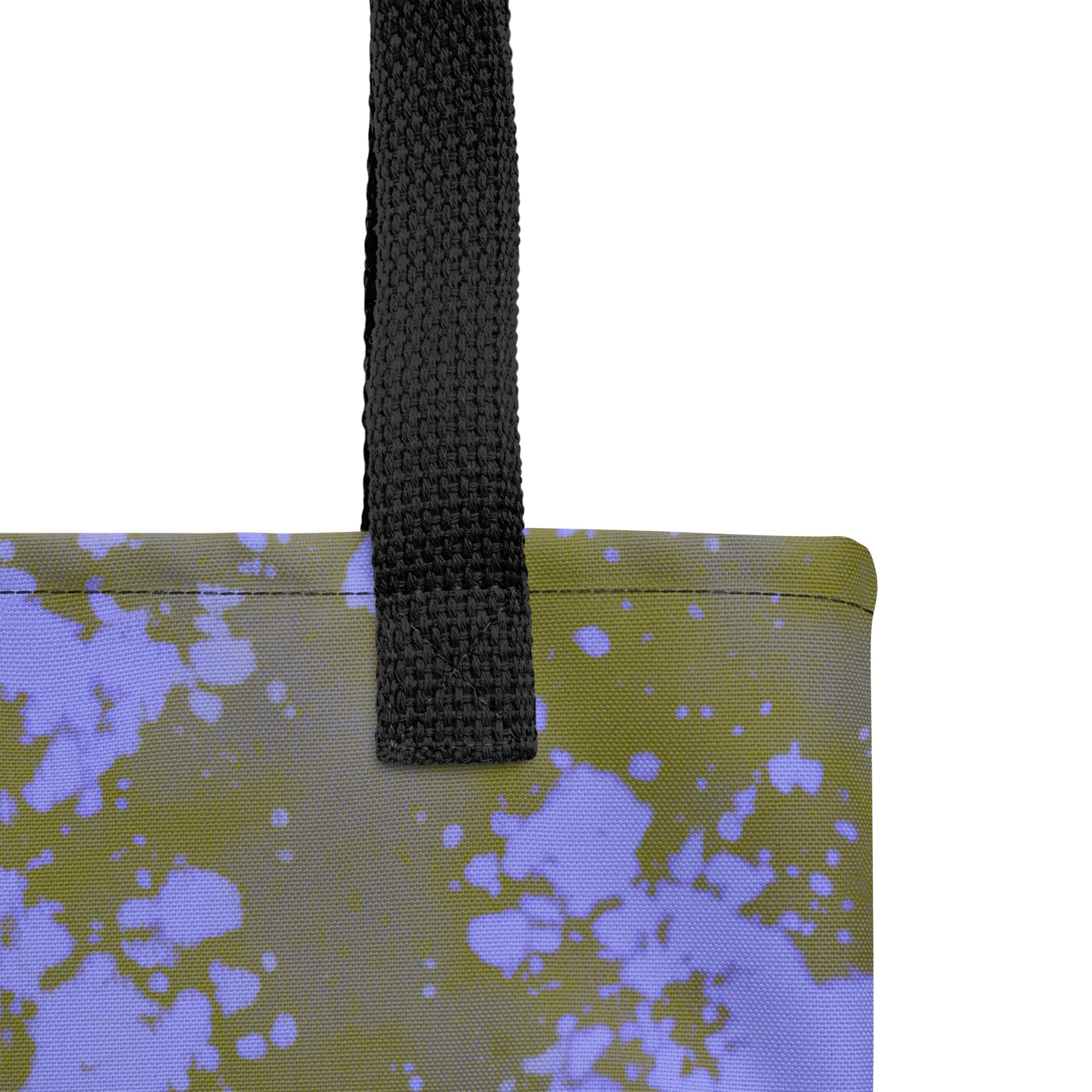 Close-up of a modern artistic tote inspired by nature and abstract paint effects. Designed by TASHAU.