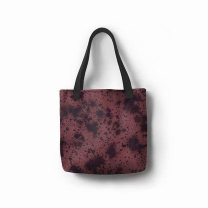 TASHAU Volcanic Dusk artistic print tote bag featuring deep brown and black tones.
