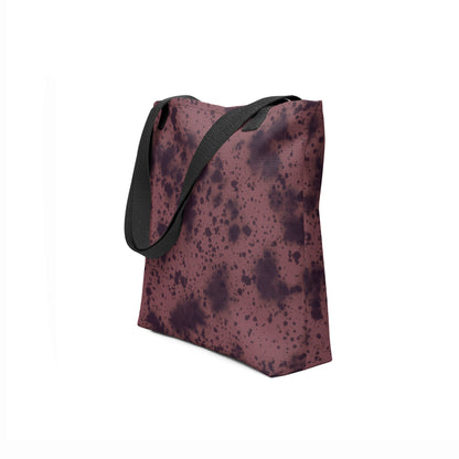 TASHAU Volcanic Dusk tote bag in natural brown with black details.